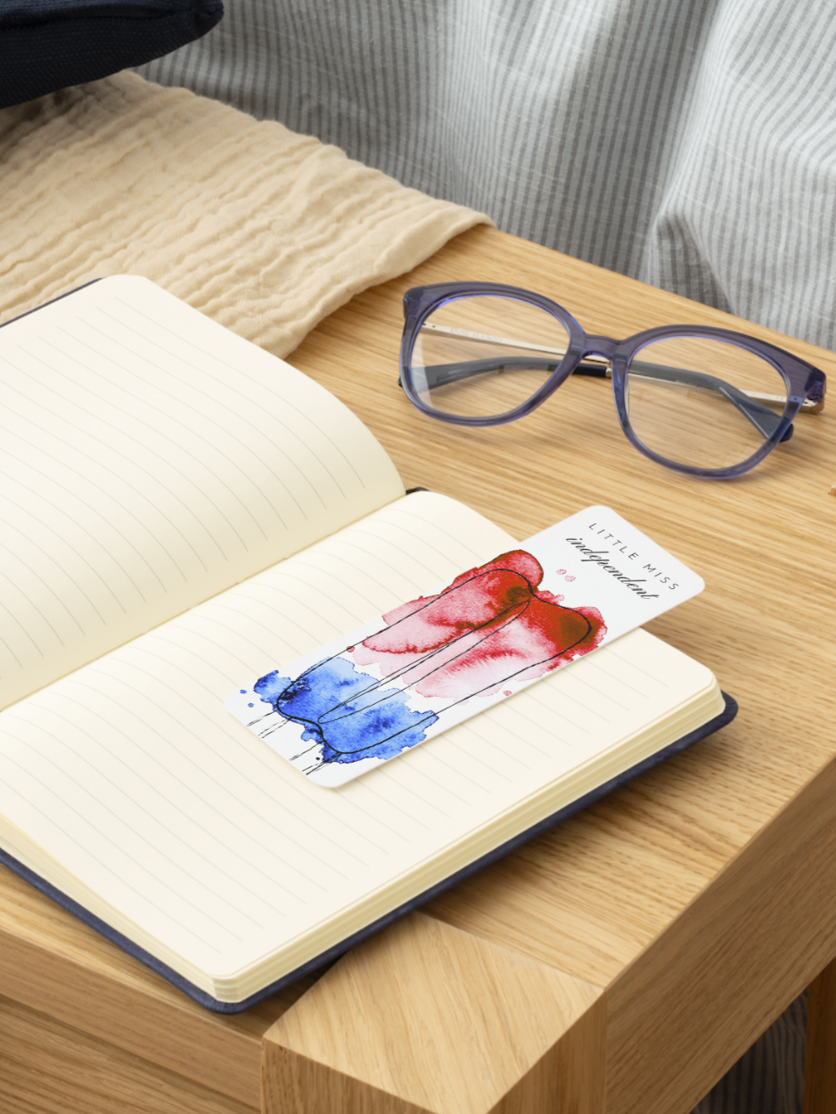 Little Miss Independent bookmark featuring a hand-painted red, white, and blue twin popsicle in watercolor. Patriotic summer bookmark inspired by Fourth of July nostalgia, designed by Amanda Broyles Art.