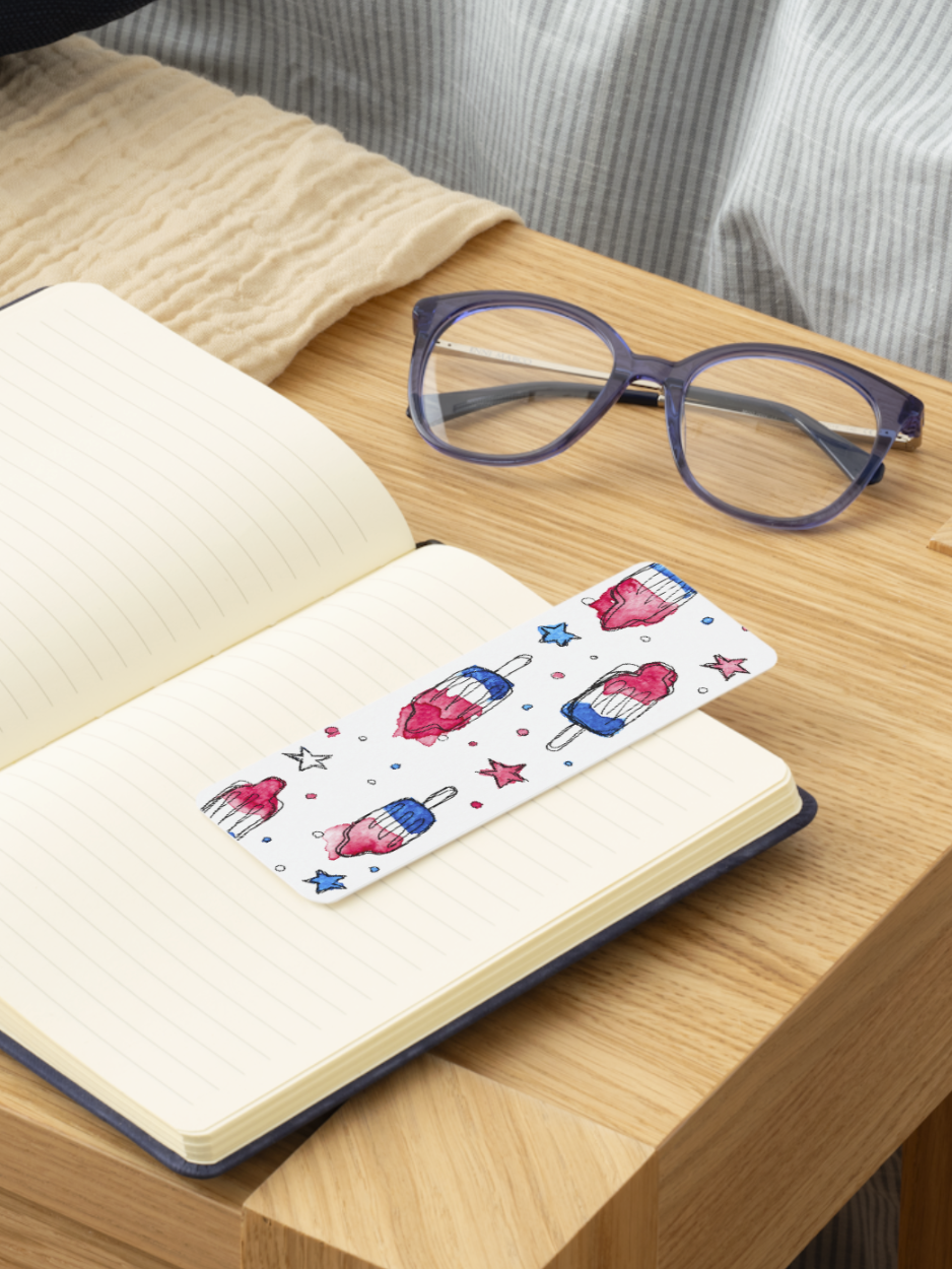 Patriotic Popsicle Bookmark featuring hand-painted red, white, and blue twin pops and stars in watercolor. Fourth of July summer bookmark printed on textured cardstock by Amanda Broyles Art.