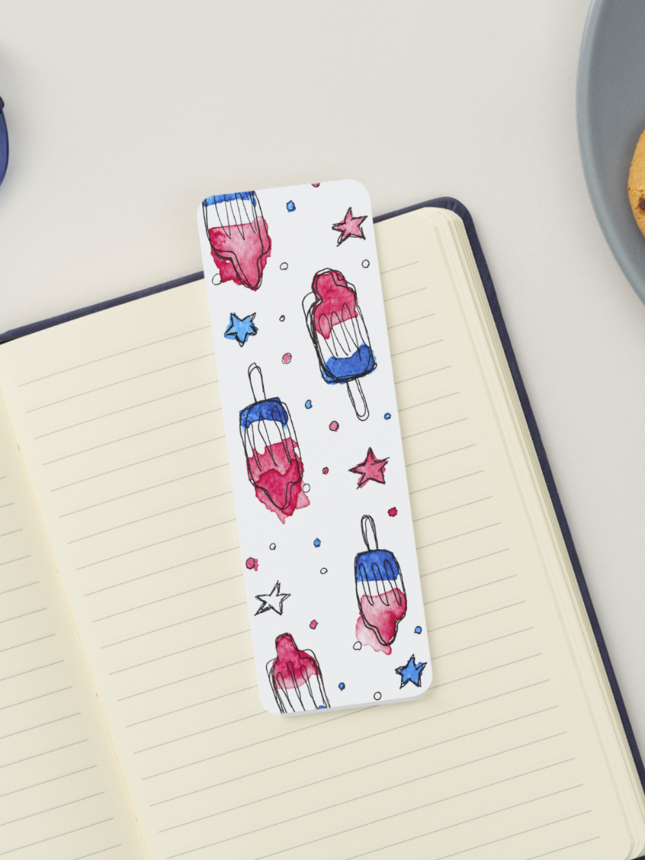 Patriotic Popsicle Bookmark featuring hand-painted red, white, and blue twin pops and stars in watercolor. Fourth of July summer bookmark printed on textured cardstock by Amanda Broyles Art.