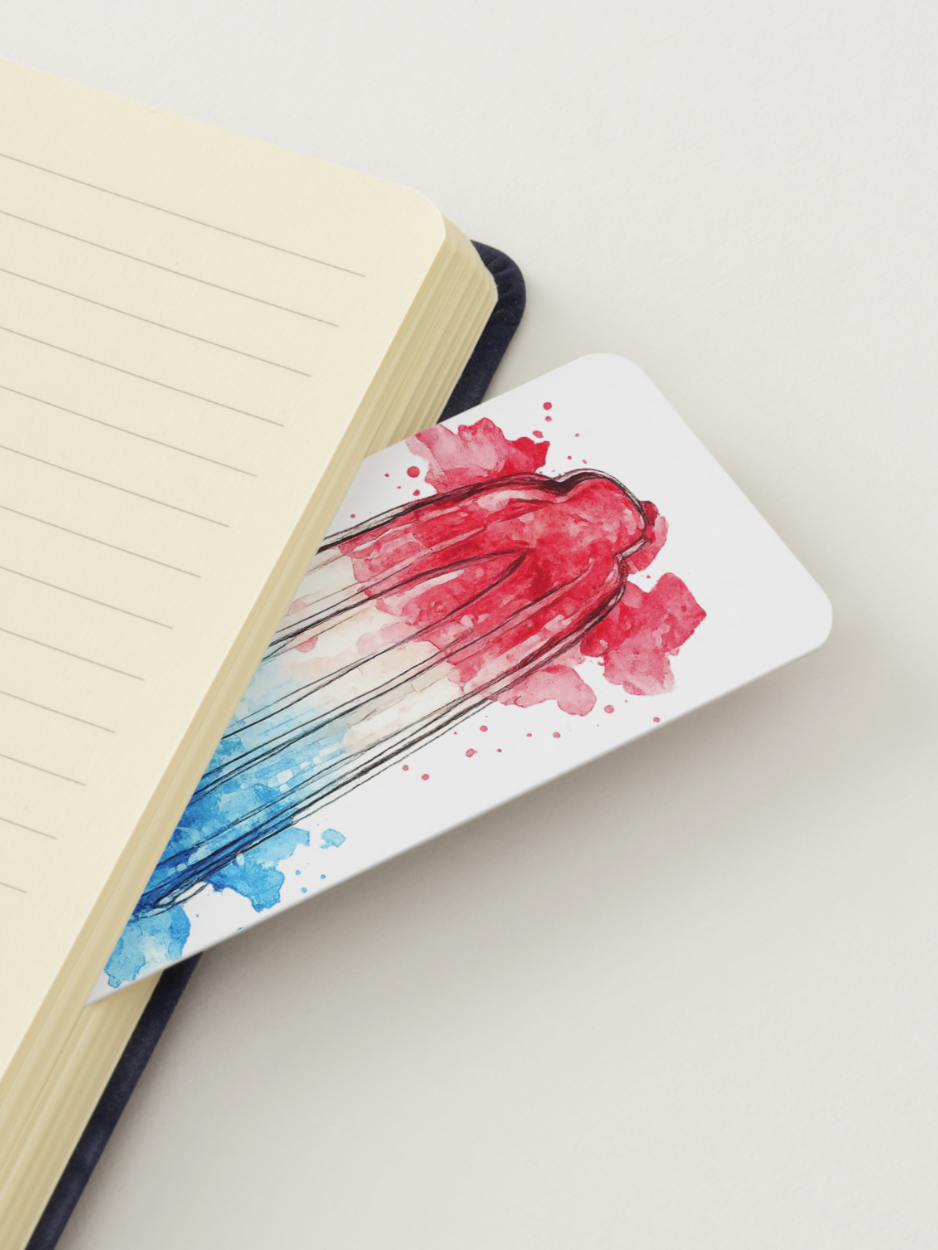 Red white and blue Bomb Pop watercolor bookmark inspired by classic popsicles, featuring hand-painted artwork and printed on textured cardstock for summer reading and patriotic gifts.