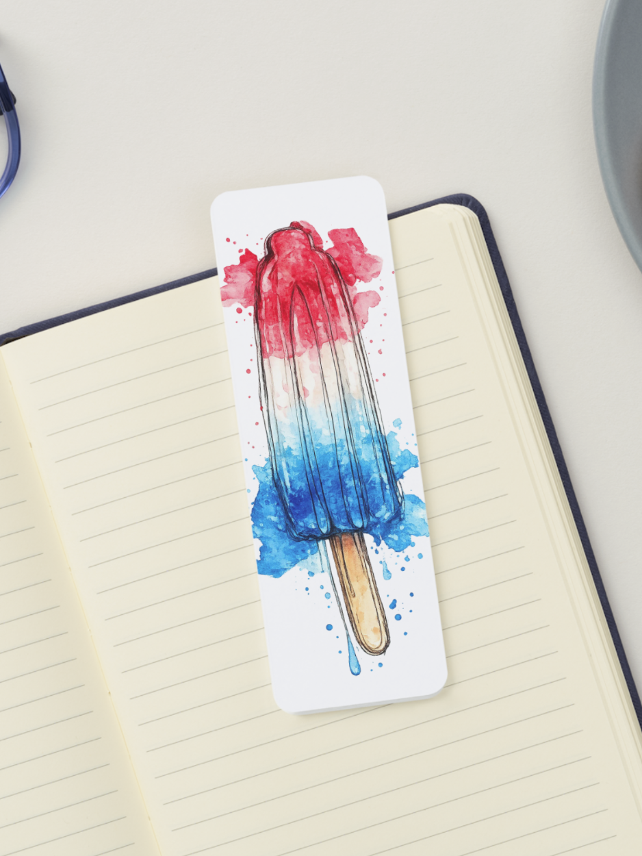 Red white and blue Bomb Pop watercolor bookmark inspired by classic popsicles, featuring hand-painted artwork and printed on textured cardstock for summer reading and patriotic gifts.